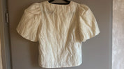 Statement top met pofmouwen beige